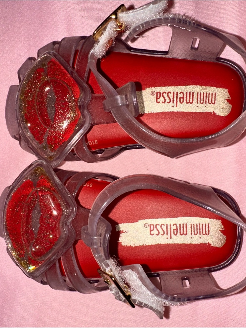Mini Melissa Clear Jelly Sandals with Red Glitter Lip Accent